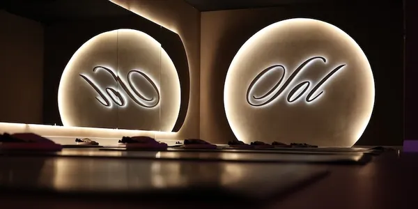Sol logo reflected in studio mirror